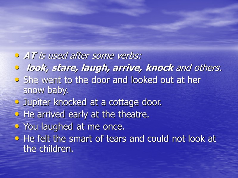 AT is used after some verbs:  look, stare, laugh, arrive, knock and others.